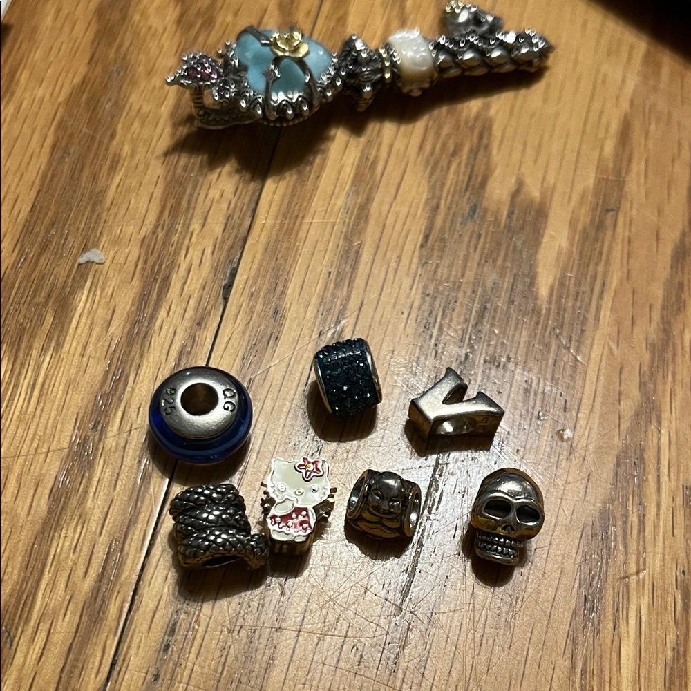 Lot of 7 charms for a Pandora type bracelet